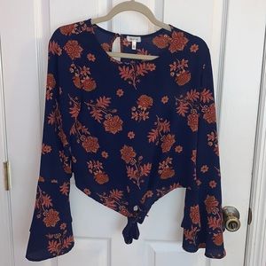 Medium long sleeve blouse in perfect condition.
